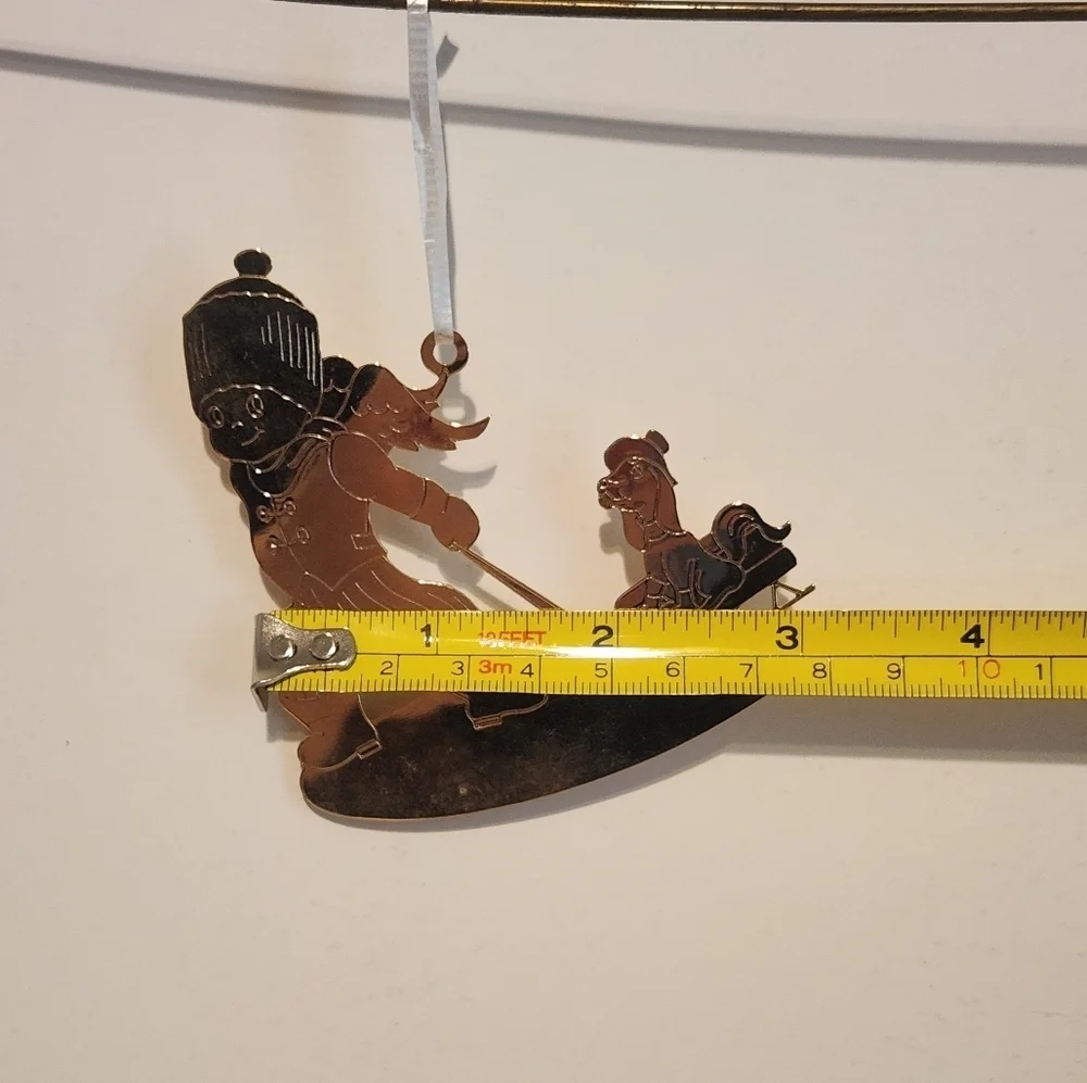 3 1/4” Vintage 1979 Pressed Brass Christmas Ornament Angel pulling Dog on Sled